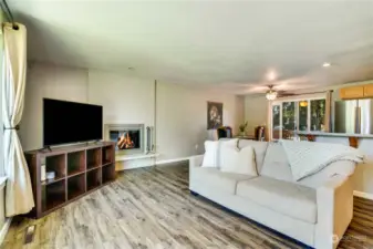 The spacious living room, dining, kitchen and bbq deck welcomes you.