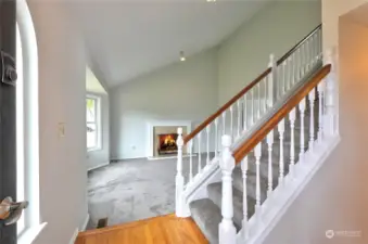 Entrance foyer with hardwood floors and all new interior paint and carpet!