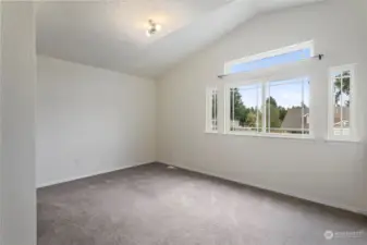 Bedroom 1 w/ vaulted ceiling