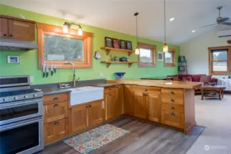 Kitchen with double sink, Kitchenaid five burner propane stove/electric double oven