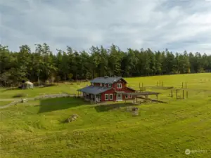 Farmhouse with yurt to the left, upper pasture to the right