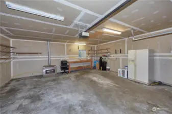 The first of 3 great garage / shop spaces! Each is separate from the next, so you can keep your clean cars away from your messy hobbies!