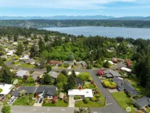 Generous 9,800 SF corner lot in this coveted neighborhood, with sweeping views to the South and Southeast