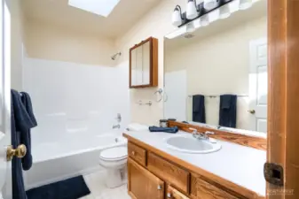 full bathroom at the top of the stairs