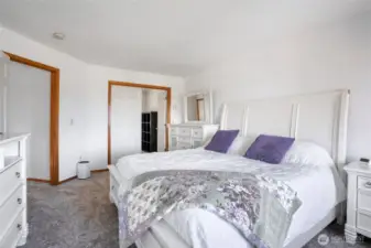 Primary bedroom (bonus room through the doors