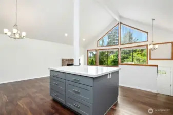 Open living & brand new kitchen with vaulted ceilings, dining area leads to large deck & fence backyard with all new floors.