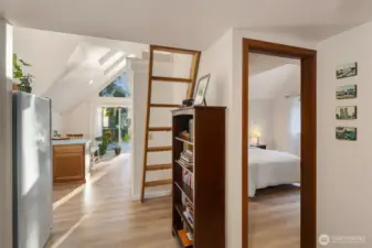 Light and bright living space with bedroom and bathroom.
