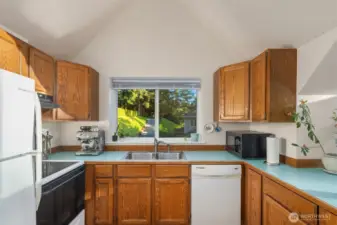 This dainty kitchen has everything you need at your fingertips.