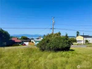 Views of the Olympic Mountains and Puget Sound, and sunsets