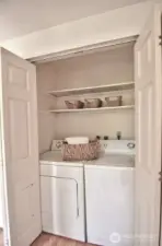 Convenient placement of washer/dryer central in each unit.