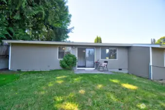 Exteriors recently repainted! The units were built offset from one another, creating more privacy indoors and out.