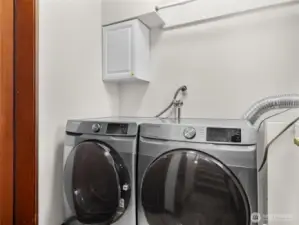 Deluxe washer/dryer included.