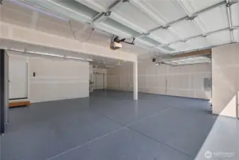 4 CAR GARAGE _ RUSTOLEUM FLAKED FLOORS