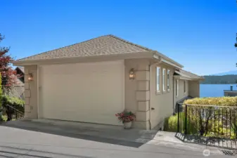 4 car garages, shop and paved parking.