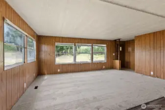 Second home living room w/new carpet.