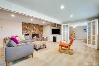 It's time to visit the finished daylight basement with its living room, bonus room/playroom, kitchenette, 2 bedrooms, 3/4 bath, storage room, boiler room with a brand new boiler, and sliding glass doors to the patio.