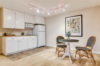 The kitchenette enhances the convenience and versatility of the daylight basement. Fix a quick snack, make coffee, host parties, or consider the multi-generational living potential.