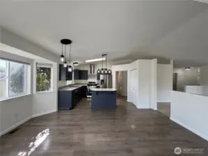 Kitchen opens to dining space.