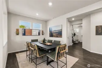 Enjoy hosting with large formal dining room. Actual home is under construction and finishes, colors, and materials may vary. See site agent for details.