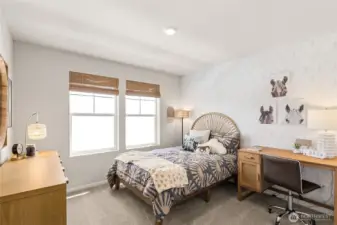 Bedroom 2. Actual home is under construction and finishes, colors, and materials may vary. See site agent for details.