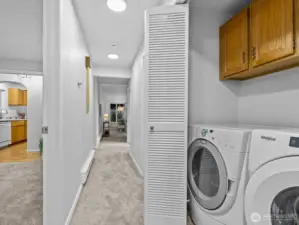 Across the hall is the in unit laundry area conveniently located to all of the bedrooms.