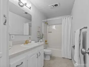 Nice sized guest bathroom.