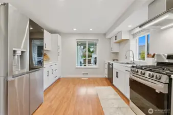 Updated kitchen with modern appliances and ample storage