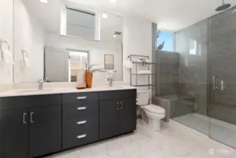 A relaxing vibe and clean-lined finishes make this primary en-suite bathroom your ultimate retreat after a long day.