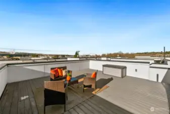 Step out onto your expansive rooftop deck and take in views of the city and mountains. With gas, water, and electricity access, this space is ready for BBQs, rooftop gardening, or simply soaking up the Seattle skyline."