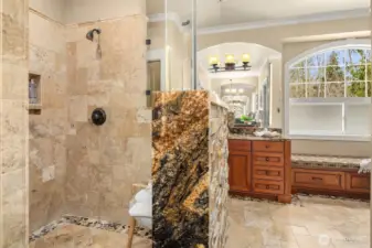 One of a kind, stone spa primary bath offers lots of storage, dual closets and space plumbed for freestanding tub