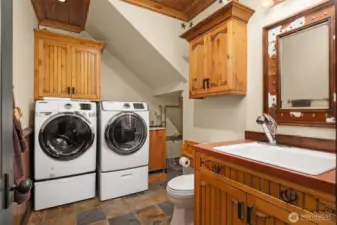 Barn powder bath with laundry on main level of barn