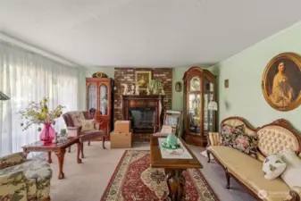 Front living room with fireplace (wood behind the electric one)