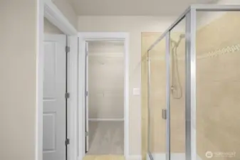 Primary bathroom and large walk in closet