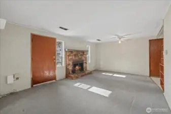 View of living space and entry to garage.