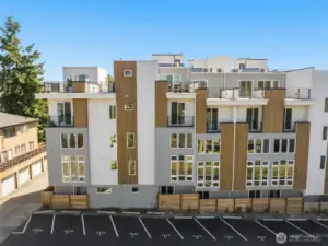 Yes, parking! The builder has paid for 5-years of leased onsite parking in the lot next door!