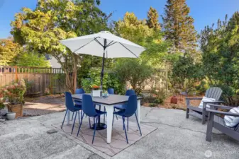 Large backyard is fully fenced, south facing, and filled with established native plants.