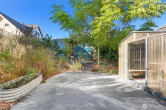 Second sunny patio provide space for entertaining, or convert into a parking pad for additional off-street parking.