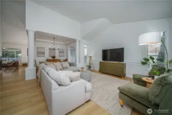 Inside, soaring vaulted ceilings, custom wainscoting, and luxury flooring set the tone.