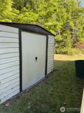 Storage shed included
