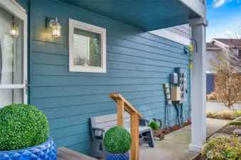 Cute front porch welcomes you to this lovely home.