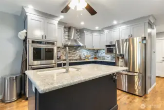 Double oven, ceiling fan, upgraded fixtures, appliances and so much more!