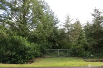 THIS IS THE OTHER DOUBLE GATE!  IT HAS SINCE TREED IN, BUT CAN BE CLEARED IF YOU WOULD LIKE!