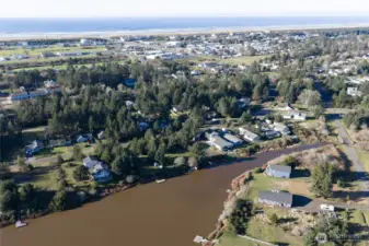 AERIAL VIEW OF THE PROPERTY SHOWING THE PACIFIC OCEAN IN THE BACKGROUND!
