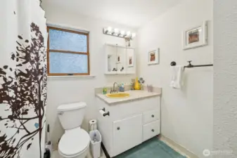 Primary bathroom with bathtub and an additional stand up shower