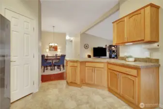 Back out to the dining area, and island with seating.