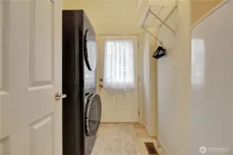 Classic style utility room with back door access.