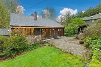 Enjoy the patio and mature landscaping in the front yard.