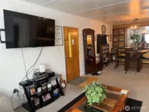 large living room connecting to dining room