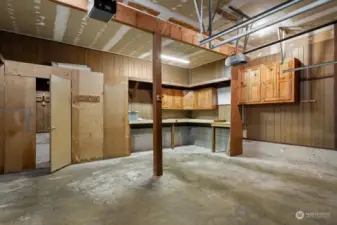 Generous two-car garage with lots of built-in cupboards for storage.