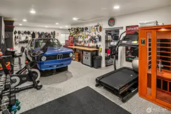 A Car-collectors/hobbyist dream: The 1,485 square foot attached garage/shop (future theater room, home office?) was expanded by the Homeowners in 2011 with parking up to 5-6 cars.